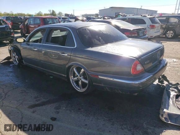 2005 Jaguar XJ Vanden Plas z VIN SAJWA82C65SG42753, wystawiony jako Copart lot #73792534 z przebiegiem 141 936 mil mil oraz Szkoda całkowita • Salvage title. Historia ofert i sprzedaży dostępna na DreamBid. Obrazek 2.