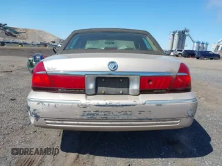 1998 Mercury Grand Marquis GS z VIN 2MEFM74W3WX668888, wystawiony jako IAAI lot #42042350 z przebiegiem 113 702 mil mil oraz . Historia ofert i sprzedaży dostępna na DreamBid. Obrazek 17.