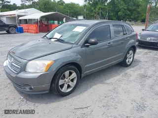 2012 Dodge Caliber SXT with VIN 1C3CDWDA6CD510605, listed as a IAAI auction lot 42104688 with 221,059 mi miles. Bid and sale history available at carsss.com. Image 2.
