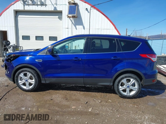 2014 Ford Escape SE with VIN 1FMCU9G99EUD02098, listed as a IAAI auction lot 41814969 with 210,218 mi miles and . Bid and sale history available at DreamBid. Image 15.