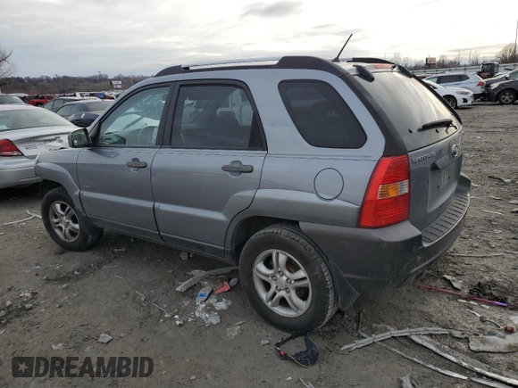 2005 Kia Sportage LX with VIN KNDJE723X57064082, listed as a Copart auction lot 86177214 with Not Provided miles and Salvage Title. Bid and sale history available at carsss.com. Image 2.