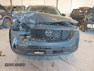2024 Mazda CX-50 S Select with VIN 7MMVABAM0RN221288, listed as a IAAI auction lot 40983418 with 9,744 mi miles and . Bid and sale history available at DreamBid. Image 6.
