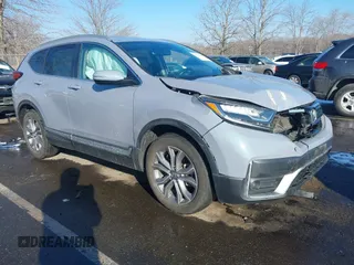 2021 Honda CR-V Touring with VIN 2HKRW2H97MH680203, listed as a IAAI auction lot 41357188 with 50,211 mi miles. Bid and sale history available at carsss.com. Image 1.