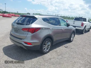 2018 Hyundai Santa Fe 2.0T с VIN 5NMZU4LAXJH057363, выставлен на аукционе IAAI как лот 42265981 с пробегом 118 536 миль миль и . История ставок и продаж доступна на DreamBid. Изображение 4.
