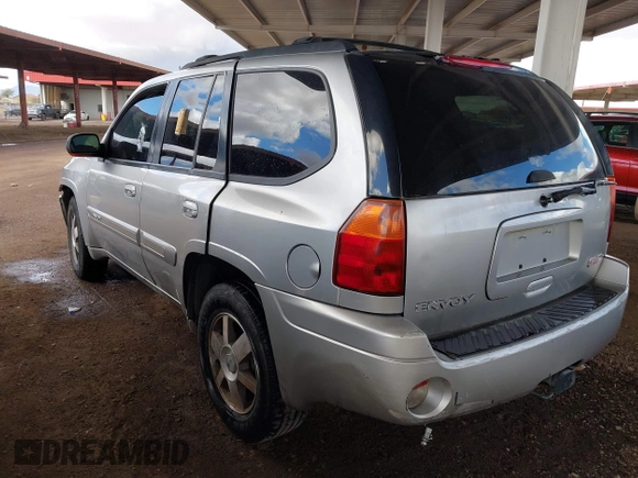 2004 GMC Envoy SLT with VIN 1GKDS13S942267554, listed as a IAAI auction lot 41754066 with 178,895 mi miles. Bid and sale history available at carsss.com. Image 3.