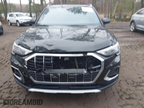 2021 Audi Q3 Premium with VIN WA1AUCF34M1148531, listed as a IAAI auction lot 41815286 with 31,934 mi miles and . Bid and sale history available at DreamBid. Image 12.