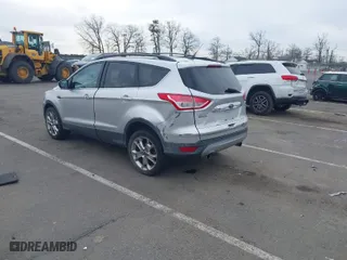 2013 Ford Escape SEL with VIN 1FMCU9HX0DUC58424, listed as a IAAI auction lot 41607775 with 120,147 mi miles. Bid and sale history available at carsss.com. Image 3.
