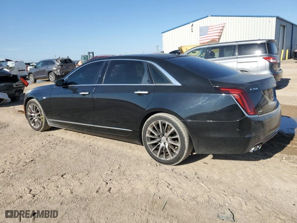 2017 Cadillac CT6 Luxury AWD with VIN 1G6KD5RS0HU144749, listed as a Copart auction lot 66474244 with 138,781 mi miles and Salvage Title. Bid and sale history available at carsss.com. Image 2.