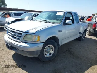 2002 Ford F-150 XL with VIN 1FTRX07242KA59876, listed as a IAAI auction lot 42673613 with 85,536 mi miles and . Bid and sale history available at DreamBid. Image 2.