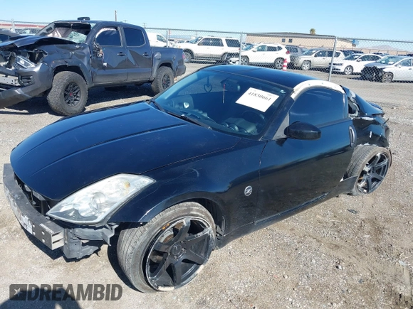 2004 Nissan 350Z Touring with VIN JN1AZ34D94M102990, listed as a IAAI auction lot 41830661 with 107,520 mi miles. Bid and sale history available at carsss.com. Image 2.