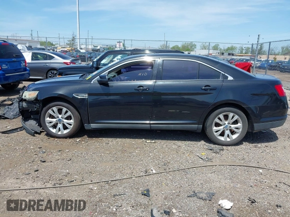 2011 Ford Taurus SEL with VIN 1FAHP2EW6BG127102, listed as a IAAI auction lot 42131123 with 168,965 mi miles. Bid and sale history available at carsss.com. Image 14.