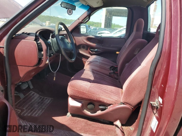 1998 Ford F-150 z VIN 1FTZF17W1WNA59477, wystawiony jako Copart lot #55849255 z przebiegiem 107 471 mil mil oraz Szkoda całkowita • Salvage title. Historia ofert i sprzedaży dostępna na DreamBid. Obrazek 7.