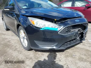 2016 Ford Focus SE with VIN 1FADP3F24GL248175, listed as a IAAI auction lot 41867019 with 135,471 mi miles. Bid and sale history available at carsss.com. Image 13.