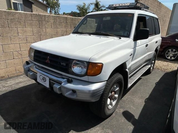 2000 Mitsubishi Montero z VIN JA4MR51R6YJ002305, wystawiony jako Copart lot #50263015 z przebiegiem 138 861 mil mil oraz Czysty tytuł • Clean title. Historia ofert i sprzedaży dostępna na DreamBid. Obrazek 2.