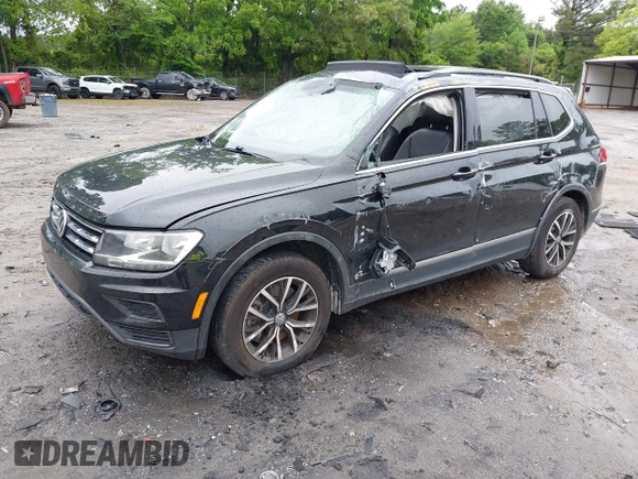 2021 Volkswagen Tiguan SE with VIN 3VV3B7AX6MM021502, listed as a IAAI auction lot 42243705 with 60,988 mi miles and . Bid and sale history available at DreamBid. Image 16.