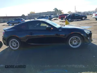 2014 Scion FR-S z VIN JF1ZNAA18E9700718, wystawiony jako IAAI lot #40958319 z przebiegiem 104 010 mil mil oraz . Historia ofert i sprzedaży dostępna na DreamBid. Obrazek 14.