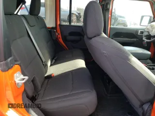 2023 Jeep Wrangler Sport with VIN 1C4HJXDG8PW687459, listed as a Copart auction lot 87302924 with 16,637 mi miles and Salvage Title. Bid and sale history available at DreamBid. Image 10.