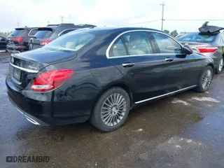 2016 Mercedes-Benz C-Class C 300 Luxury with VIN 55SWF4KB0GU150456, listed as a IAAI auction lot 41920406 with 124,371 mi miles. Bid and sale history available at carsss.com. Image 4.