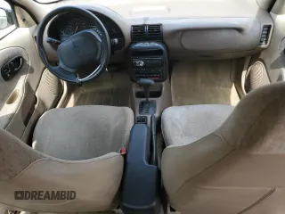 1999 Saturn SL z VIN 1G8ZH5283XZ349797, wystawiony jako Copart lot #58221955 z przebiegiem 148 506 mil mil oraz Nie do naprawy. Historia ofert i sprzedaży dostępna na DreamBid. Obrazek 8.