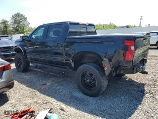 2019 Chevrolet Silverado 1500 LTZ with VIN 3GCUYGEL5KG147953, listed as a Copart auction lot 59009204 with 61,984 mi miles and Salvage Title. Bid and sale history available at carsss.com. Image 2.