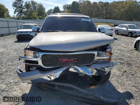 2006 GMC Yukon SLT with VIN 1GKEK13T96J110533, listed as a Copart auction lot 77797364 with 209,339 mi miles and Salvage Title. Bid and sale history available at carsss.com. Image 5.