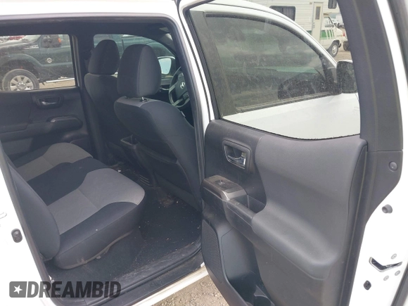2022 Toyota Tacoma SR with VIN 3TMCZ5AN1NM478457, listed as a IAAI auction lot 42479107 with 59,547 mi miles and . Bid and sale history available at DreamBid. Image 8.