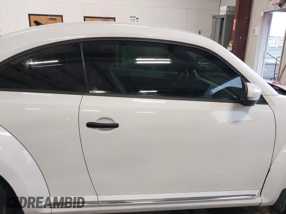 2017 Volkswagen Beetle 1.8T Fleet with VIN 3VWF17AT2HM629497, listed as a IAAI auction lot 41181493 with 68,564 mi miles. Bid and sale history available at carsss.com. Image 14.