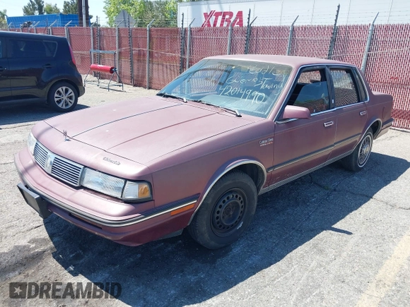 1988 Oldsmobile Cutlass Ciera with VIN 2G3AM5132J9375426, listed as a IAAI auction lot 42014990 with 292,060 mi miles and . Bid and sale history available at DreamBid. Image 2.