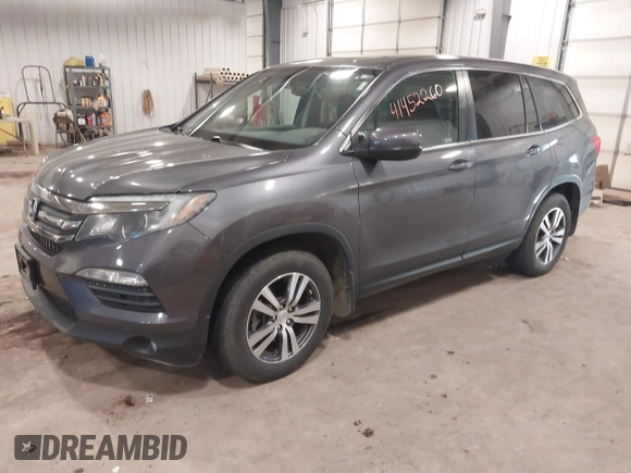 2018 Honda Pilot EX-L with VIN 5FNYF6H52JB052141, listed as a IAAI auction lot 41452260 with 113,382 mi miles. Bid and sale history available at carsss.com. Image 2.