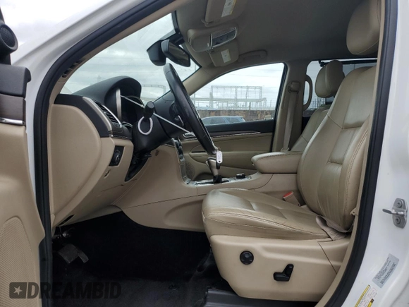 2016 Jeep Grand Cherokee Limited 75th Anniversary with VIN 1C4RJFBG3GC311867, listed as a Copart auction lot 50824975 with 141,125 mi miles and Salvage Title. Bid and sale history available at DreamBid. Image 7.