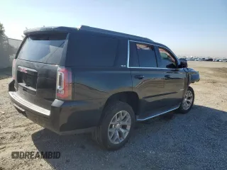 2019 GMC Yukon SLE with VIN 1GKS1AKC9KR166202, listed as a Copart auction lot 50103275 with 55,208 mi miles and Salvage Title. Bid and sale history available at carsss.com. Image 3.