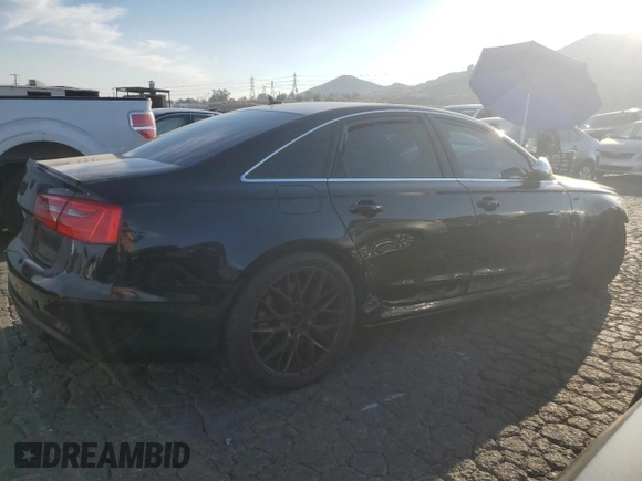 2013 Audi S6 Prestige z VIN WAUJ2AFC7DN143877, wystawiony jako Copart lot #80368324 z przebiegiem Nie podano mil oraz Szkody całkowita. Historia ofert i sprzedaży dostępna na DreamBid. Obrazek 3.