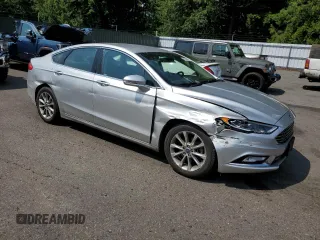 2017 Ford Fusion SE with VIN 3FA6P0HD4HR187841, listed as a Copart auction lot 61766415 with 74,303 mi miles and Salvage title. Bid and sale history available at DreamBid. Image 4.