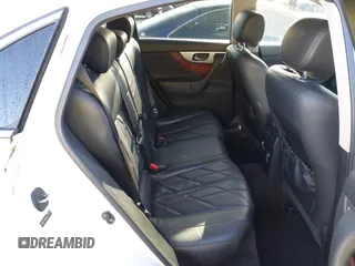 2014 Infiniti QX70 with VIN JN8CS1MW2EM411237, listed as a IAAI auction lot 42011806 with 148,133 mi miles and . Bid and sale history available at carsss.com. Image 8.