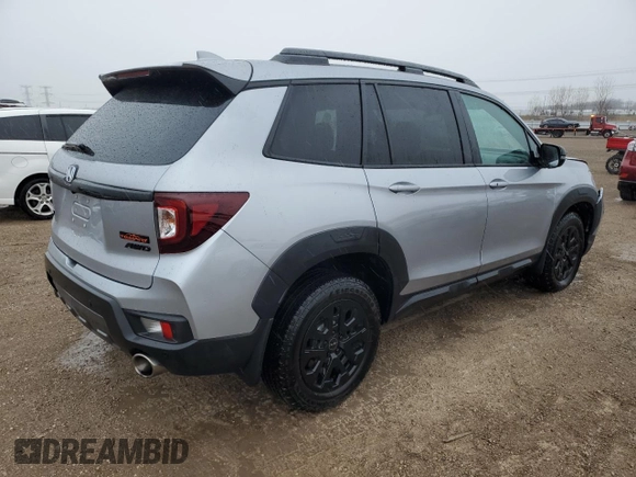 2023 Honda Passport TrailSport with VIN 5FNYF8H64PB044233, listed as a Copart auction lot 53522015 with 10,458 mi miles and Salvage title. Bid and sale history available at DreamBid. Image 3.