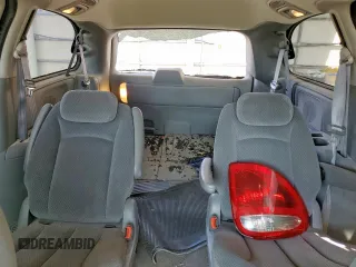 2005 Dodge Caravan SXT with VIN 2D4GP44L75R335536, listed as a Copart auction lot 60933985 with 212,231 mi miles and Salvage title. Bid and sale history available at DreamBid. Image 10.