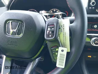 2022 Honda Civic Si with VIN 2HGFE1E52NH474042, listed as a IAAI auction lot 42099415 with 26,828 mi miles and . Bid and sale history available at DreamBid. Image 11.