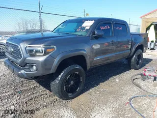 2016 Toyota Tacoma SR with VIN 3TMCZ5AN0GM015471, listed as a IAAI auction lot 41660876 with 81,031 mi miles. Bid and sale history available at carsss.com. Image 2.