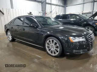 2011 Audi A8 z VIN WAURVAFD8BN005569, wystawiony jako Copart lot #52101065 z przebiegiem 104 893 mil mil oraz Szkody całkowita. Historia ofert i sprzedaży dostępna na DreamBid. Obrazek 4.