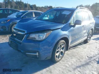 2017 Subaru Forester Touring with VIN JF2SJATC7HH446341, listed as a IAAI auction lot 41500149 with 145,969 mi miles. Bid and sale history available at carsss.com. Image 2.