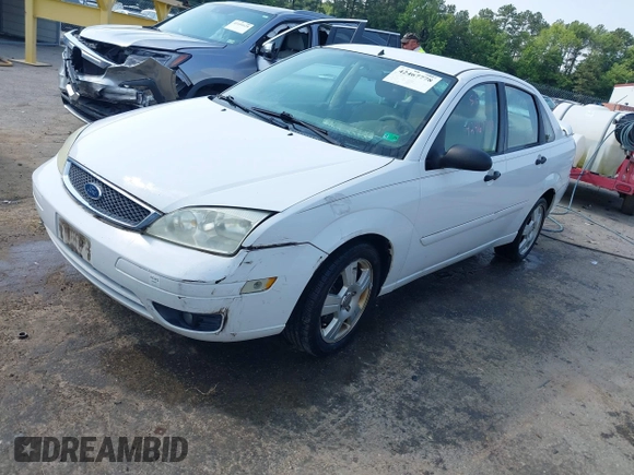 2005 Ford Focus S with VIN 1FAHP34N45W230950, listed as a IAAI auction lot 42467778 with 203,697 mi miles and . Bid and sale history available at DreamBid. Image 2.