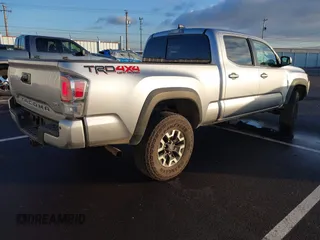 2023 Toyota Tacoma SR5 z VIN 3TMDZ5BN6PM156824, wystawiony jako IAAI lot #41031932 z przebiegiem 14 226 mil mil oraz . Historia ofert i sprzedaży dostępna na DreamBid. Obrazek 4.