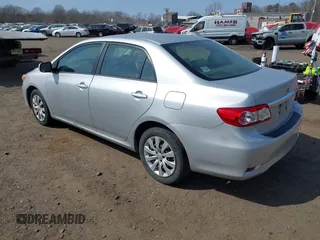 2012 Toyota Corolla L with VIN 2T1BU4EE7CC842871, listed as a IAAI auction lot 41782205 with 213,186 mi miles. Bid and sale history available at carsss.com. Image 3.
