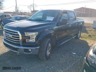 2015 Ford F-150 XLT with VIN 1FTEW1EG3FFC90398, listed as a IAAI auction lot 41665025 with 159,480 mi miles. Bid and sale history available at carsss.com. Image 2.