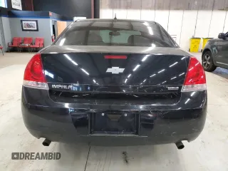 2014 Chevrolet Impala LS with VIN 2G1WA5E31E1112222, listed as a Copart auction lot 55479325 with 213,634 mi miles and Salvage Title. Bid and sale history available at DreamBid. Image 6.
