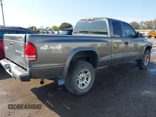2004 Dodge Dakota SLT with VIN 1D7HG42N44S618405, listed as a IAAI auction lot 40895893 with 172,324 mi miles. Bid and sale history available at carsss.com. Image 4.