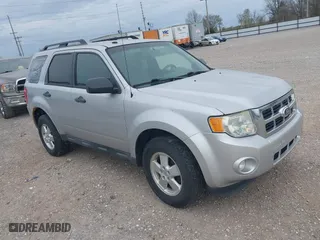 2011 Ford Escape XLT with VIN 1FMCU9D72BKB26439, listed as a IAAI auction lot 41914514 with 242,172 mi miles. Bid and sale history available at carsss.com. Image 1.