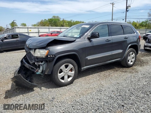 2011 Jeep Grand Cherokee Laredo z VIN 1J4RR4GG8BC738468, wystawiony jako Copart lot #54907215 z przebiegiem 182 576 mil mil oraz Szkoda całkowita • Salvage title. Historia ofert i sprzedaży dostępna na DreamBid. Obrazek 1.