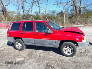 1996 Jeep Grand Cherokee Laredo with VIN 1J4EX58S8TC122302, listed as a IAAI auction lot 41218573 with 195,392 mi miles. Bid and sale history available at carsss.com. Image 13.
