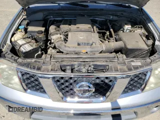 2005 Nissan Frontier LE z VIN 1N6AD07W95C443995, wystawiony jako Copart lot #61102285 z przebiegiem 248 740 mil mil oraz Czysty tytuł • Clean title. Historia ofert i sprzedaży dostępna na DreamBid. Obrazek 11.